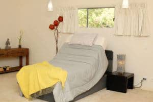 Reclining bed in an upright position.