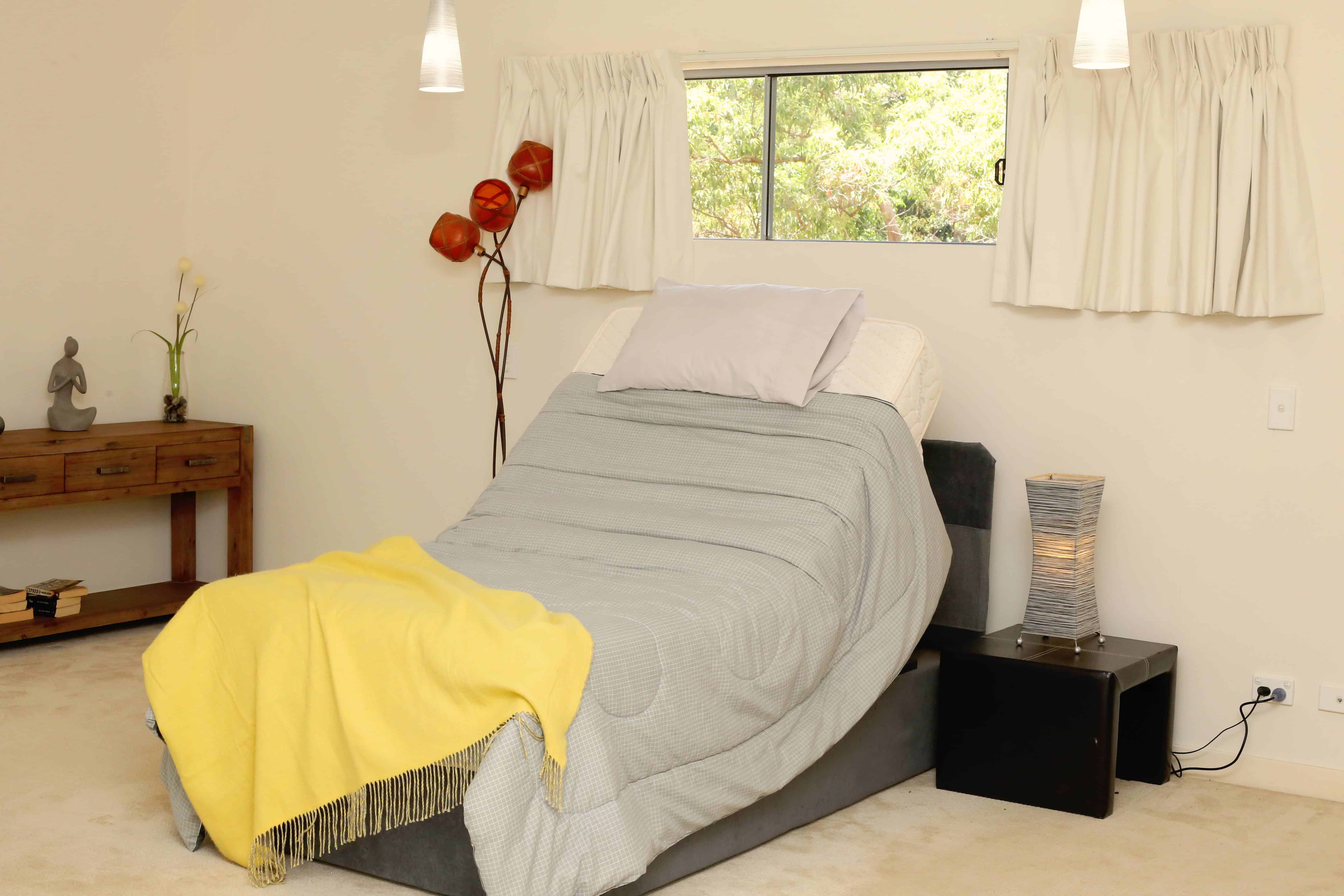 Reclining bed in an upright position.